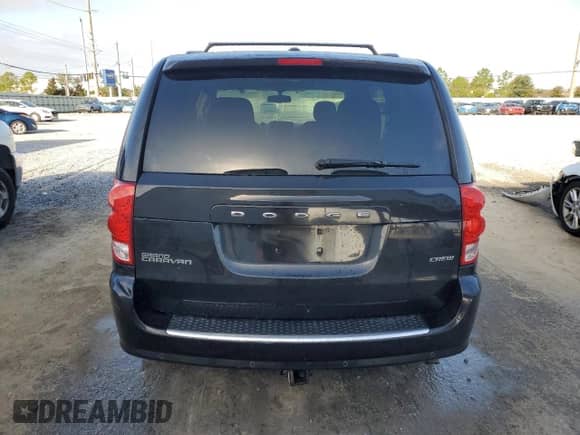 2012 Dodge Grand Caravan Crew with VIN 2C4RDGDG5CR348463, listed as a Copart auction lot 85729765 with 185,415 mi miles and Salvage title. Bid and sale history available at DreamBid. Image 6.