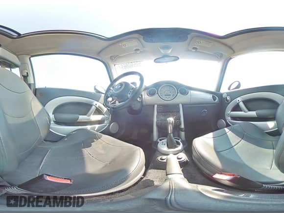 2004 MINI Hardtop with VIN WMWRC33454TJ56308, listed as a Copart auction lot 59690865 with 99,374 mi miles and Salvage title. Bid and sale history available at DreamBid. Image 14.