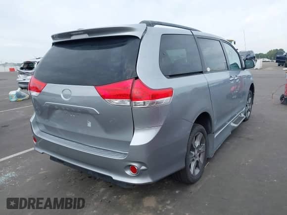 2014 Toyota Sienna SE with VIN 5TDXK3DC6ES421515, listed as a IAAI auction lot 43102179 with 63,756 mi miles and . Bid and sale history available at DreamBid. Image 4.