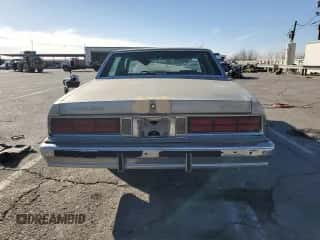 1986 Chevrolet Caprice Classic Brougham с VIN 1G1BN69Z4GX107626, выставлен на аукционе Copart как лот 42607765 с пробегом 90 001 миль миль и Списание • Salvage title. История ставок и продаж доступна на DreamBid. Изображение 6.