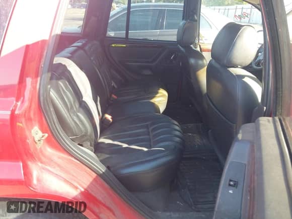 2000 Jeep Grand Cherokee Limited z VIN 1J4GW58N5YC186410, wystawiony jako IAAI lot #42504152 z przebiegiem 140 982 mil mil oraz . Historia ofert i sprzedaży dostępna na DreamBid. Obrazek 8.