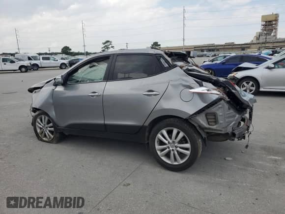 2012 Hyundai Tucson Limited z VIN KM8JUCAC0CU404458, wystawiony jako Copart lot #67262015 z przebiegiem Nie podano mil oraz Szkoda całkowita • Salvage title. Historia ofert i sprzedaży dostępna na DreamBid. Obrazek 2.