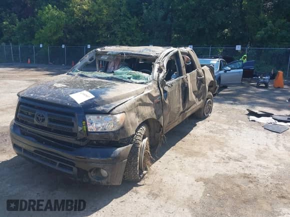 2012 Toyota Tundra z VIN 5TFDY5F17CX241833, wystawiony jako IAAI lot #42844507 z przebiegiem 155 427 mil mil oraz . Historia ofert i sprzedaży dostępna na DreamBid. Obrazek 17.