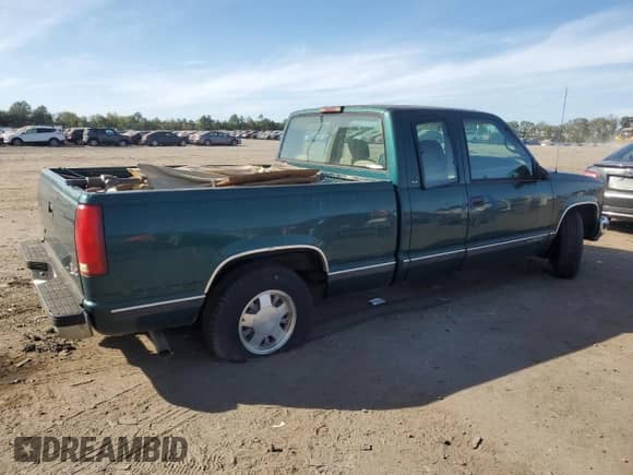1998 GMC Sierra 1500 z VIN 2GTEC19M9W1555549, wystawiony jako Copart lot #85330205 z przebiegiem 92 604 mil mil oraz Czysty tytuł • Clean title. Historia ofert i sprzedaży dostępna na DreamBid. Obrazek 3.