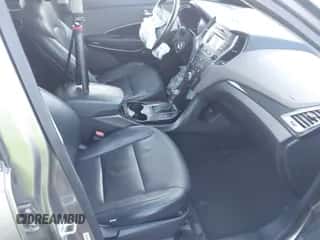 2014 Hyundai Santa Fe with VIN 5XYZU3LB2EG200499, listed as a IAAI auction lot 43392142 with 228,552 mi miles and . Bid and sale history available at DreamBid. Image 5.