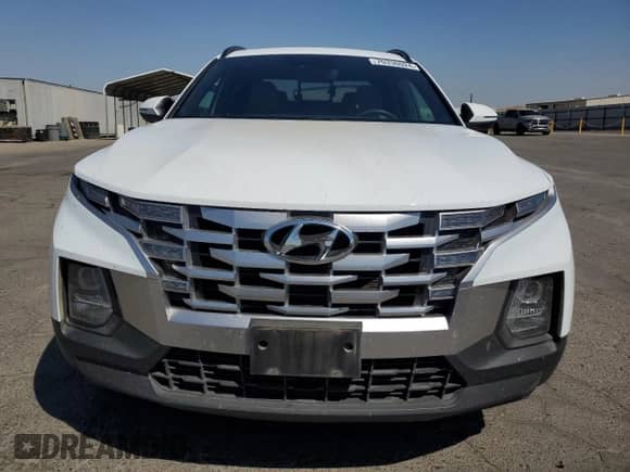 2022 Hyundai Santa Cruz SEL with VIN 5NTJCDAE9NH017954, listed as a Copart auction lot 70330024 with 61,631 mi miles and Salvage title. Bid and sale history available at DreamBid. Image 5.