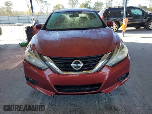 2016 Nissan Altima SR with VIN 1N4AL3AP8GC197670, listed as a Copart auction lot 82434905 with 70,672 mi miles and Salvage title. Bid and sale history available at DreamBid. Image 5.