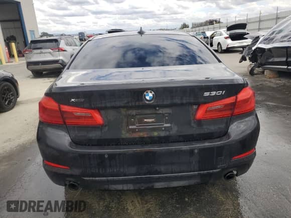 2018 BMW 5 Series 530i xDrive with VIN WBAJA7C58JG907540, listed as a Copart auction lot 82029705 with 125,793 mi miles and Clean title. Bid and sale history available at DreamBid. Image 6.