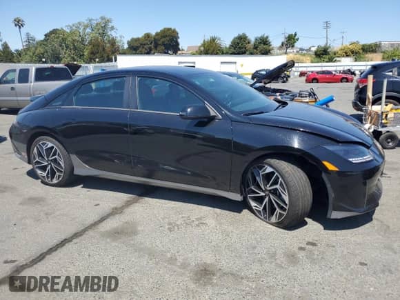 2023 Hyundai Ioniq 6 SEL with VIN KMHM34AA6PA037206, listed as a Copart auction lot 64690015 with 82,115 mi miles and Salvage title. Bid and sale history available at DreamBid. Image 4.