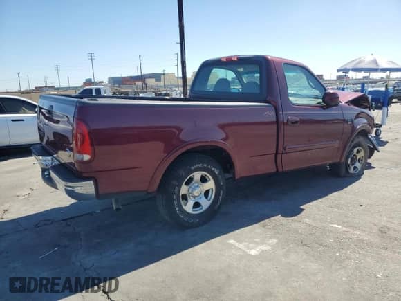 1999 Ford F-150 XL z VIN 1FTRF17L7XKB29041, wystawiony jako Copart lot #87046755 z przebiegiem Nie podano mil oraz Szkoda całkowita • Salvage title. Historia ofert i sprzedaży dostępna na DreamBid. Obrazek 3.