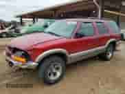 2000 Chevrolet Blazer LT with VIN 1GNCS13W3Y2213772, listed as a Copart auction lot 79964794 with 80,090 mi miles and Salvage title. Bid and sale history available at DreamBid. Image 1.