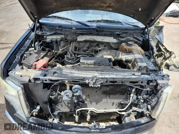 2013 Ford F-150 XL с VIN 1FTFW1EF4DFA80370, выставлен на аукционе Copart как лот 64759655 с пробегом 258 677 миль миль и Списание • Salvage title. История ставок и продаж доступна на DreamBid. Изображение 11.