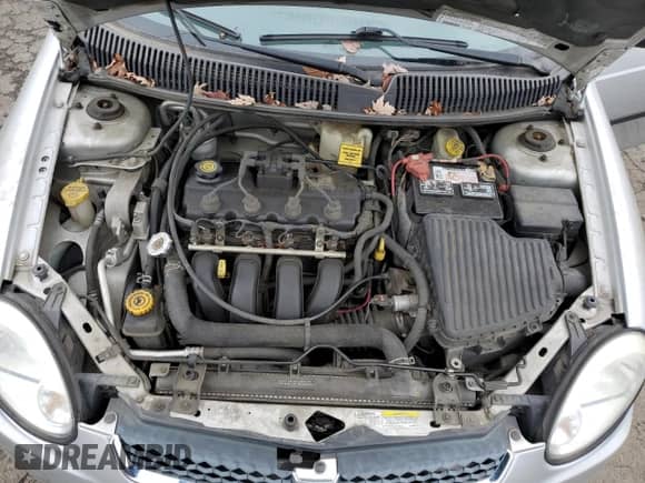 2004 Dodge Neon SE z VIN 1B3ES26C64D539980, wystawiony jako Copart lot #85826044 z przebiegiem 110 018 mil mil oraz Czysty tytuł • Clean title. Historia ofert i sprzedaży dostępna na DreamBid. Obrazek 11.