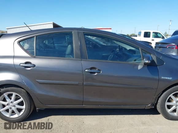 2013 Toyota Prius Three with VIN JTDKDTB32D1037041, listed as a IAAI auction lot 43401357 with 117,651 mi miles and . Bid and sale history available at DreamBid. Image 14.