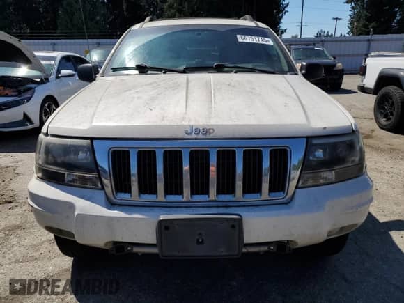 2004 Jeep Grand Cherokee with VIN 1J4GX58J64C158409, listed as a Copart auction lot 66751745 with 184,209 mi miles and Clean title. Bid and sale history available at DreamBid. Image 5.