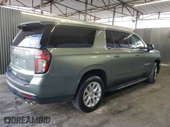 2023 Chevrolet Suburban Premier with VIN 1GNSCFKD8PR318691, listed as a Copart auction lot 87294985 with 94,427 mi miles and Clean title. Bid and sale history available at DreamBid. Image 3.