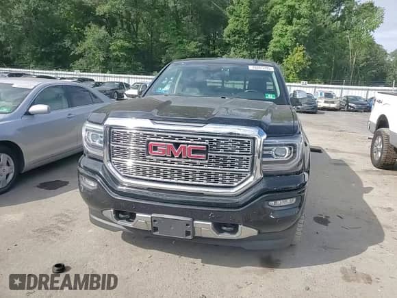 2018 GMC Sierra 1500 Denali with VIN 3GTU2PECXJG521358, listed as a Copart auction lot 70265395 with 99,289 mi miles and Salvage title. Bid and sale history available at DreamBid. Image 13.