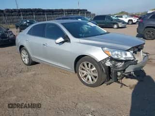 2015 Chevrolet Malibu LTZ z VIN 1G11F5SL7FF197464, wystawiony jako IAAI lot #43224667 z przebiegiem 140 351 mil mil oraz . Historia ofert i sprzedaży dostępna na DreamBid. Obrazek 1.