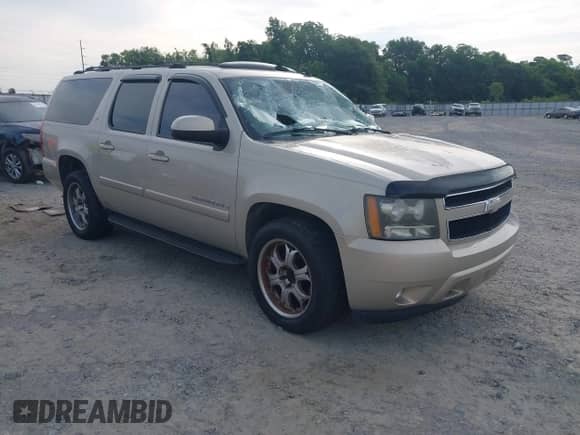2007 Chevrolet Suburban LS with VIN 1GNFC16067J230068, listed as a IAAI auction lot 42366166 with 251,429 mi miles and . Bid and sale history available at DreamBid. Image 1.