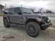 2021 Jeep Wrangler Unlimited Rubicon 392 with VIN 1C4JJXSJ3MW634325, listed as a Copart auction lot 42296345 with 52,209 mi miles and Clean title. Bid and sale history available at DreamBid. Image 4.