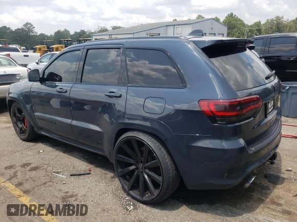 2018 Jeep Grand Cherokee SRT с VIN 1C4RJFDJ7JC236283, выставлен на аукционе Copart как лот 66556534 с пробегом 102 319 миль миль и Списание • Salvage title. История ставок и продаж доступна на DreamBid. Изображение 2.
