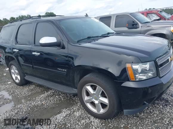 2014 Chevrolet Tahoe LS with VIN 1GNSCAE05ER128680, listed as a IAAI auction lot 42388442 with 240,611 mi miles and . Bid and sale history available at DreamBid. Image 1.