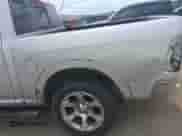 2014 Ram 1500 Laramie with VIN 1C6RR6NT0ES122640, listed as a IAAI auction lot 42638561 with 129,878 mi miles and . Bid and sale history available at DreamBid. Image 6.