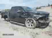 2014 Ram 1500 Sport with VIN 1C6RR6HT1ES372352, listed as a Copart auction lot 54484735 with 104,236 mi miles and Salvage title. Bid and sale history available at DreamBid. Image 4.