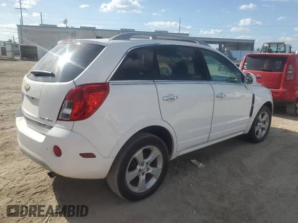 2014 Chevrolet Captiva Sport LTZ с VIN 3GNAL4EK2ES554953, выставлен на аукционе Copart как лот 77829244 с пробегом Не указан миль и Списание • Salvage title. История ставок и продаж доступна на DreamBid. Изображение 3.