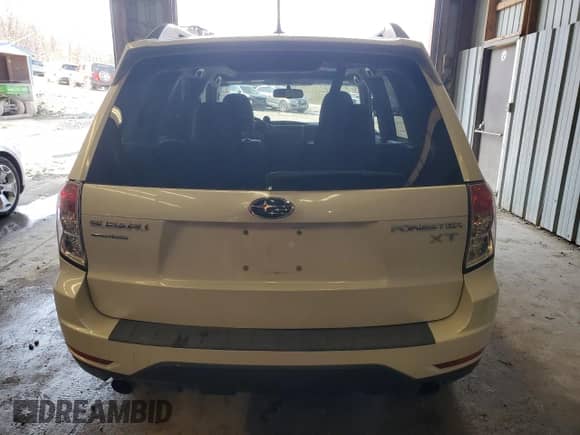 2012 Subaru Forester XT Premium z VIN JF2SHGAC0CH401851, wystawiony jako Copart lot #52932735 z przebiegiem 117 321 mil mil oraz Szkoda całkowita • Salvage title. Historia ofert i sprzedaży dostępna na DreamBid. Obrazek 6.