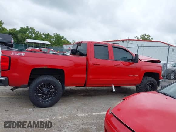 2015 Chevrolet Silverado 1500 LT with VIN 1GCVKREC5FZ177686, listed as a IAAI auction lot 43013166 with 144,825 mi miles and . Bid and sale history available at DreamBid. Image 13.