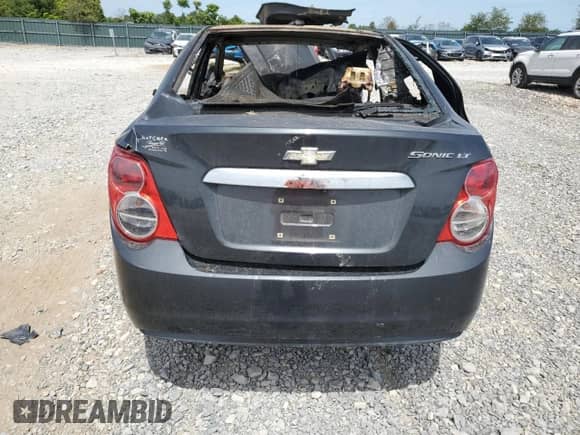 2015 Chevrolet Sonic LT with VIN 1G1JC5SH0F4143049, listed as a Copart auction lot 69755635 with Not provided miles and Salvage title. Bid and sale history available at DreamBid. Image 6.