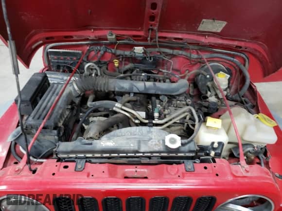 2006 Jeep Wrangler Sport z VIN 1J4FA49S16P784430, wystawiony jako Copart lot #58922835 z przebiegiem 140 024 mil mil oraz Czysty tytuł • Clean title. Historia ofert i sprzedaży dostępna na DreamBid. Obrazek 11.