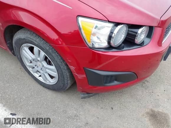 2012 Chevrolet Sonic LS z VIN 1G1JA6SH9C4160536, wystawiony jako IAAI lot #41731755 z przebiegiem 80 866 mil mil oraz . Historia ofert i sprzedaży dostępna na DreamBid. Obrazek 12.