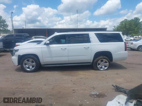 2015 Chevrolet Suburban LT z VIN 1GNSCJKC3FR598528, wystawiony jako IAAI lot #42572084 z przebiegiem 135 002 mil mil oraz . Historia ofert i sprzedaży dostępna na DreamBid. Obrazek 15.