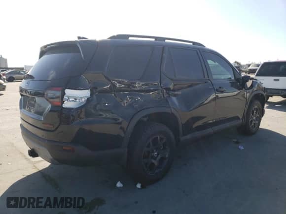 2023 Honda Pilot TrailSport with VIN 5FNYG1H66PB058087, listed as a Copart auction lot 84754824 with 26,278 mi miles and Salvage title. Bid and sale history available at DreamBid. Image 3.