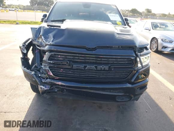 2019 Ram 1500 Laramie with VIN 1C6RREJT7KN792423, listed as a IAAI auction lot 43058571 with 118,086 mi miles and . Bid and sale history available at DreamBid. Image 18.