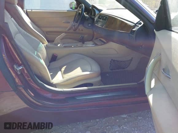 2005 BMW Z4 2.5i с VIN 4USBT33565LR70847, выставлен на аукционе IAAI как лот 41761019 с пробегом 129 341 миль миль и . История ставок и продаж доступна на DreamBid. Изображение 5.