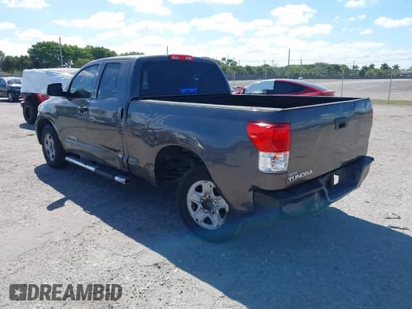 2012 Toyota Tundra z VIN 5TFRU5F19CX026861, wystawiony jako IAAI lot #41827542 z przebiegiem 135 428 mil mil oraz . Historia ofert i sprzedaży dostępna na DreamBid. Obrazek 3.
