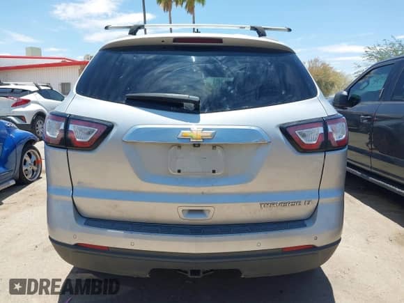 2013 Chevrolet Traverse LT with VIN 1GNKRGKD1DJ112787, listed as a IAAI auction lot 42598764 with 130,235 mi miles and . Bid and sale history available at DreamBid. Image 17.
