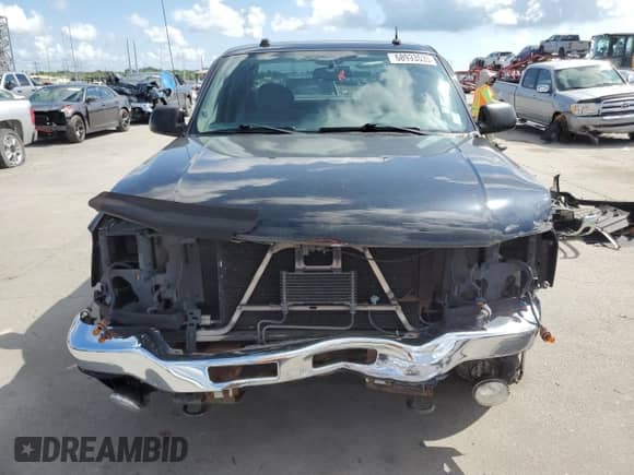 2004 GMC Sierra 1500 SLE с VIN 1GTEC19T14Z141208, выставлен на аукционе Copart как лот 68993535 с пробегом Не указан миль и Списание • Salvage title. История ставок и продаж доступна на DreamBid. Изображение 5.