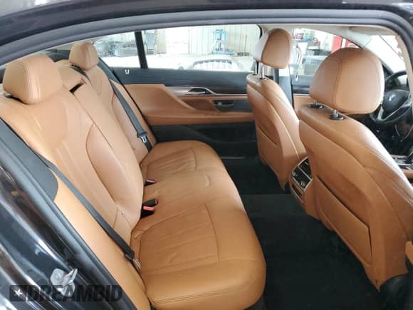 2019 BMW 7 Series 740i with VIN WBA7E2C55KB217521, listed as a Copart auction lot 68169695 with 104,317 mi miles and Salvage title. Bid and sale history available at DreamBid. Image 10.
