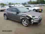 2014 Hyundai Veloster z VIN KMHTC6AD0EU196106, wystawiony jako Copart lot #69494305 z przebiegiem 102 472 mil mil oraz Szkoda całkowita • Salvage title. Historia ofert i sprzedaży dostępna na DreamBid. Obrazek 4.