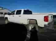 2019 Chevrolet Silverado 2500HD Work Truck z VIN 1GC1KREG7KF124470, wystawiony jako Copart lot #82181094 z przebiegiem 128 984 mil mil oraz Szkoda całkowita • Salvage title. Historia ofert i sprzedaży dostępna na DreamBid. Obrazek 2.