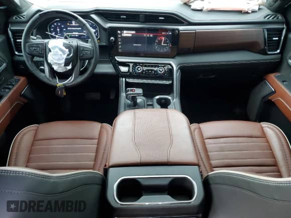 2024 GMC Sierra 1500 Denali Ultimate with VIN 1GTUUHEL3RZ368981, listed as a Copart auction lot 61587665 with 7,713 mi miles and Salvage title. Bid and sale history available at DreamBid. Image 8.