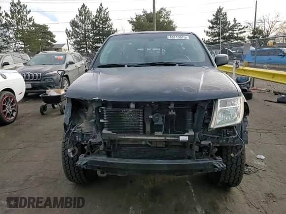 2005 Nissan Frontier SE с VIN 1N6AD06W45C402708, выставлен на аукционе Copart как лот 43715675 с пробегом 174 745 миль миль и Списание • Salvage title. История ставок и продаж доступна на DreamBid. Изображение 10.