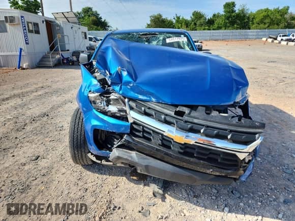 2021 Chevrolet Colorado 4WD Work Truck z VIN 1GCGTBEN9M1276991, wystawiony jako Copart lot #64677925 z przebiegiem 99 776 mil mil oraz Szkoda całkowita • Salvage title. Historia ofert i sprzedaży dostępna na DreamBid. Obrazek 5.