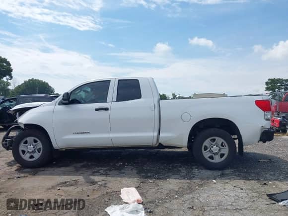 2013 Toyota Tundra z VIN 5TFRU5F14DX029880, wystawiony jako IAAI lot #43081536 z przebiegiem 198 758 mil mil oraz . Historia ofert i sprzedaży dostępna na DreamBid. Obrazek 14.
