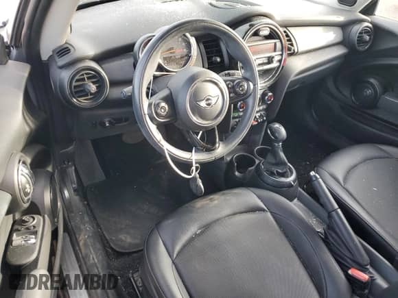 2015 MINI Hardtop with VIN WMWXM5C50FT937233, listed as a Copart auction lot 50077295 with 87,785 mi miles and Salvage title. Bid and sale history available at DreamBid. Image 8.