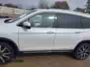 2022 Honda Pilot Touring 8-Passenger with VIN 5FNYF5H99NB001383, listed as a IAAI auction lot 41389422 with 56,055 mi miles and . Bid and sale history available at DreamBid. Image 15.